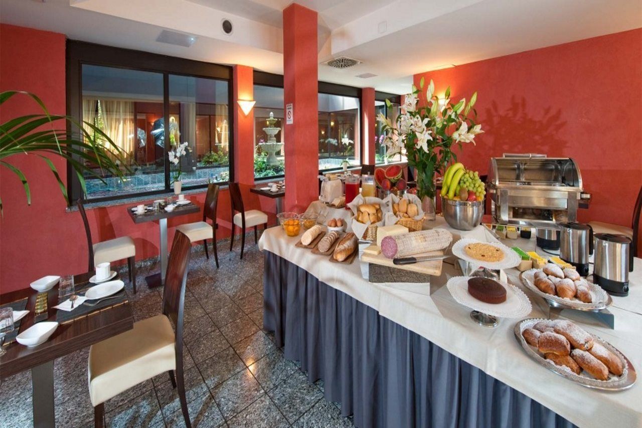 Hotel Comtur Binasco Extérieur photo